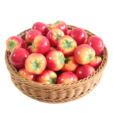 Cesta redonda de ratán para exhibición de frutas y verduras.